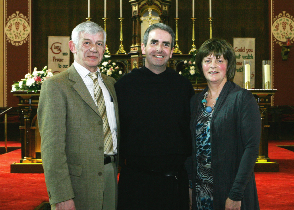 Fr Colm O’ Mahony osa on the day of his Solemn Vows in Cork in 2011 with his parents, Denis and Margaret.