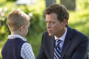Greg Kinnear as Todd Burpo and Connor Corum as his Colton in Heaven is for Real.