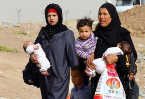 Iraqi refugees fleeing from Mosul head to the self-ruled northern Kurdish region. Image courtesy: www.hurriyetdailynews.com 