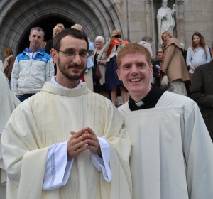 Maciej Zacharek after the ordination ceremony with a friend 