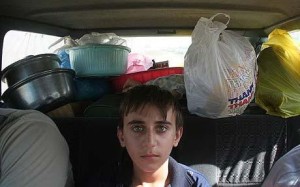 Iraqi Christians flee Mosul. 