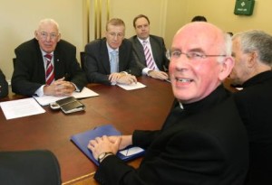 Cardinal Sean Brady meeting Ian Paisley in 2006. 