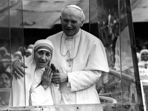 pope-john-paul-ii-holds-his-arm-around-mother-teresa