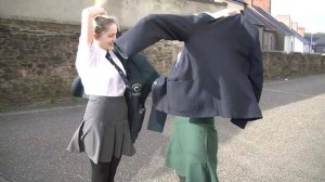Courtney Cooke, Lisneal College in Waterside, and Yvonne Weir, St Cecilia's College, Bogside exchange uniforms