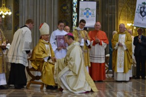 Archbishop Martin receives the pallium from the Nuncio. 