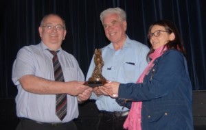 Fr Peter McVerry receives the Mother Jones award from Jim Nolan and Ailbhe O’Mahony of the Cork Mother Jones Committee. 