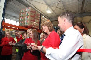 Pic shows Tanaiste and Minister for Social Protection Joan Burton cutting the ribbon with Crosscare staff Valerie Cummins (food bank manager) and Michael McDonagh (Senior Manager for food and outreach) at the opening of the Foodbank in Glasnevin Dublin. Pic John Mc Elroy.