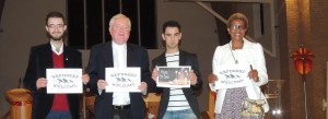 \msgr Byrne with brothers Osama and Amro Abouhajar from Syria and Patricia Murambinda from Zimbabwe