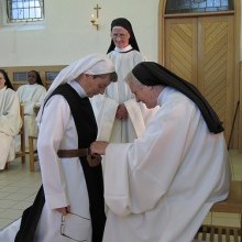 Sr Elizabeth receiving the black scapular and belt of a Junior Professed Sister from Mother Marie Fahy ocso, Abbess of Glencairn.