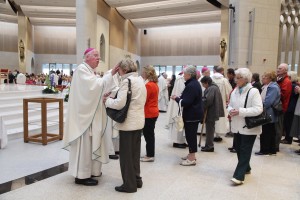 Bishop John McAreavey blessing a pilgrim on the first day of the National Eucharistic Congress in Knock. Pic John Mc Elroy.