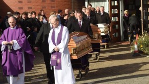 Fr Derek Farrell, parish priest at the Parish of the Travelling People and Mgr Dermot Lane, parish priest of Ballaly at the funeral of the Connors family. Pic courtesy: Independent.ie