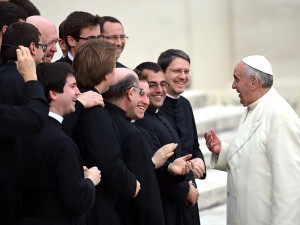 Pope Francis greets priests
