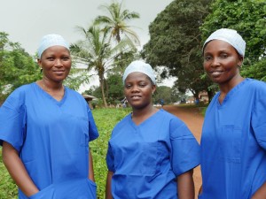 3 members of the GOAL reproductive health team are making their daily visit to the expectant mothers quarantined in this village. 