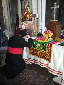 Bishop Selwanos celebrating the first mass in the St. Mayrs Church - Syrian Orthodox in Homs after the rebels left.