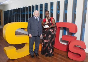 President of Ireland, Michael D. Higgins gave a keynote speech at the 2016 Irish Summit on the Sustainable Development Goals at Croke Park yesterday, hosted by Dóchas, the Irish Association of Non-Governmental Development Organisations. President of Ireland, Michael D. Higgins meets the winner of the Global Citizen of the Year Award, Colette Nkunda of Misean Cara with the Dóchas Award Trophy. Photo: Peter Houlihan 