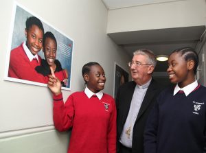 Pic shows Ashley and Irene Oka, who used the services of Crosscare, showing Archbishop Diarmuid Martin of Dublin their image at the launch of the exhibition in St Pauls Church Arran Quay Dublin. Pic John Mc Elroy. 