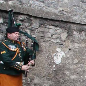 A lone piper played a lament in Kilmainham Gaol's Stonebreaker's Yard where Archbishop Diarmuid Martin layed a wreath (Pic John Mc Elroy).